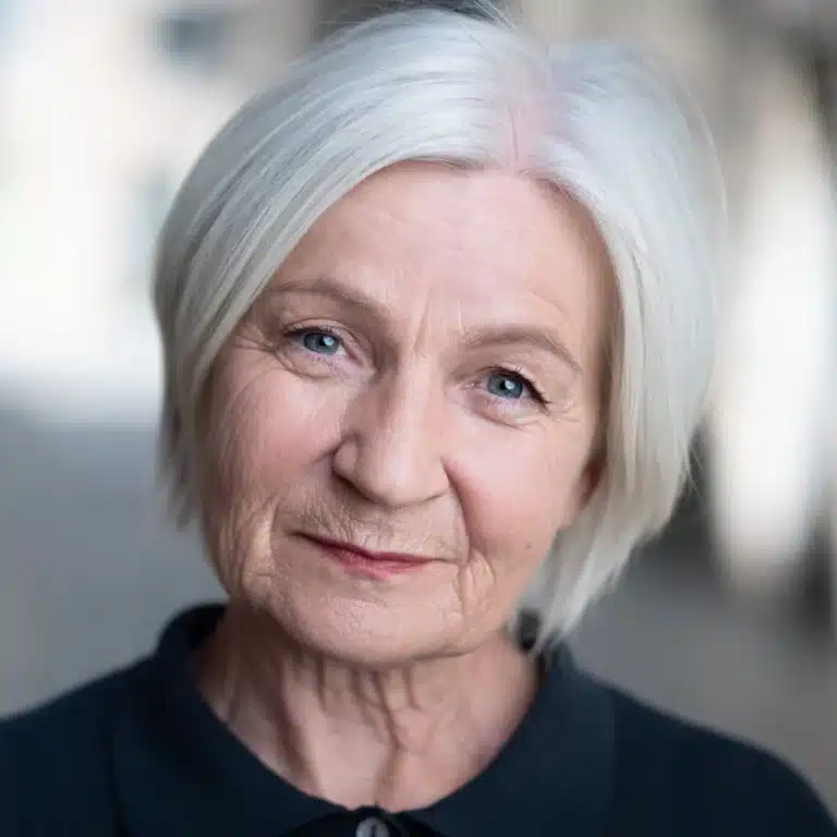 Headshot of Scottish actor, Caroline Guthrie photographed on the streets of Glasgow's Merchant City.